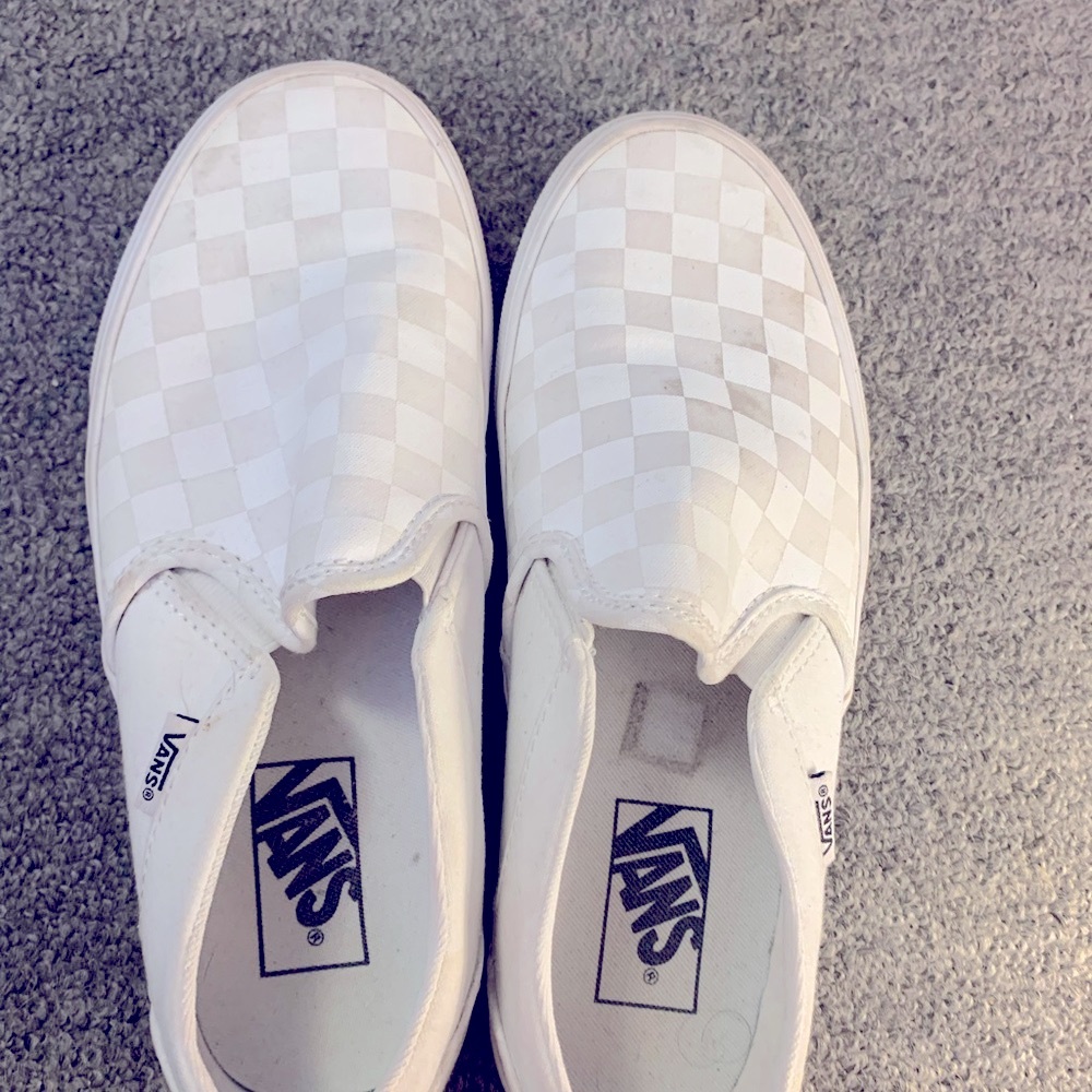 White checkered vans.Small stain on front.